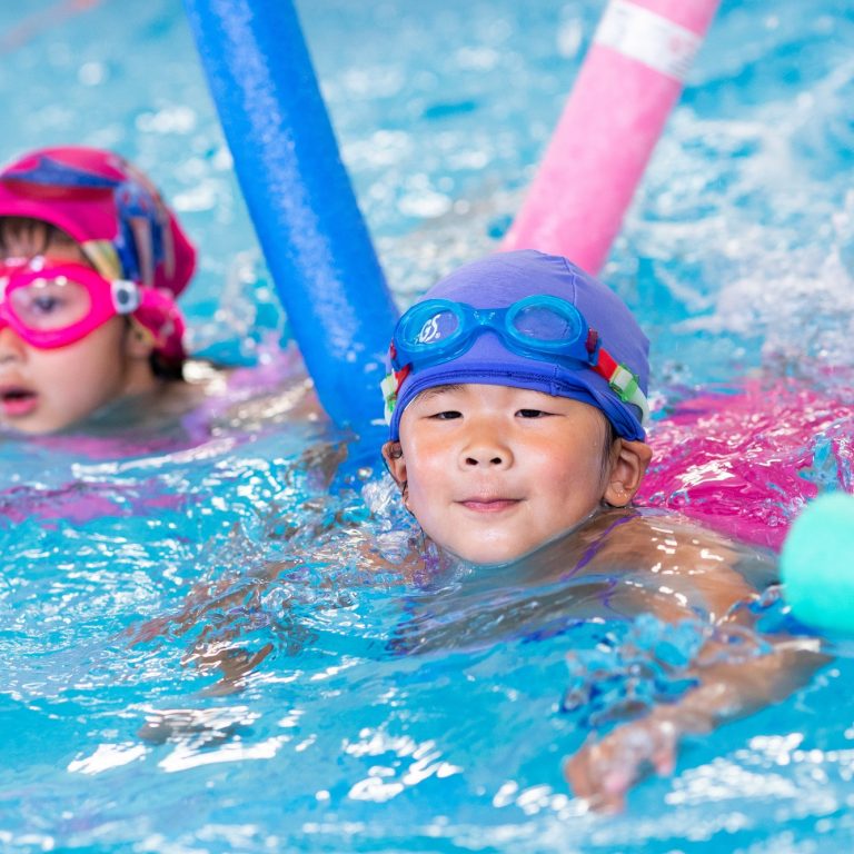 girls in a swimming pool