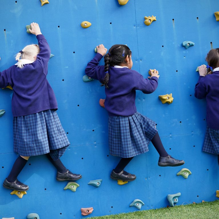 children rock climbing