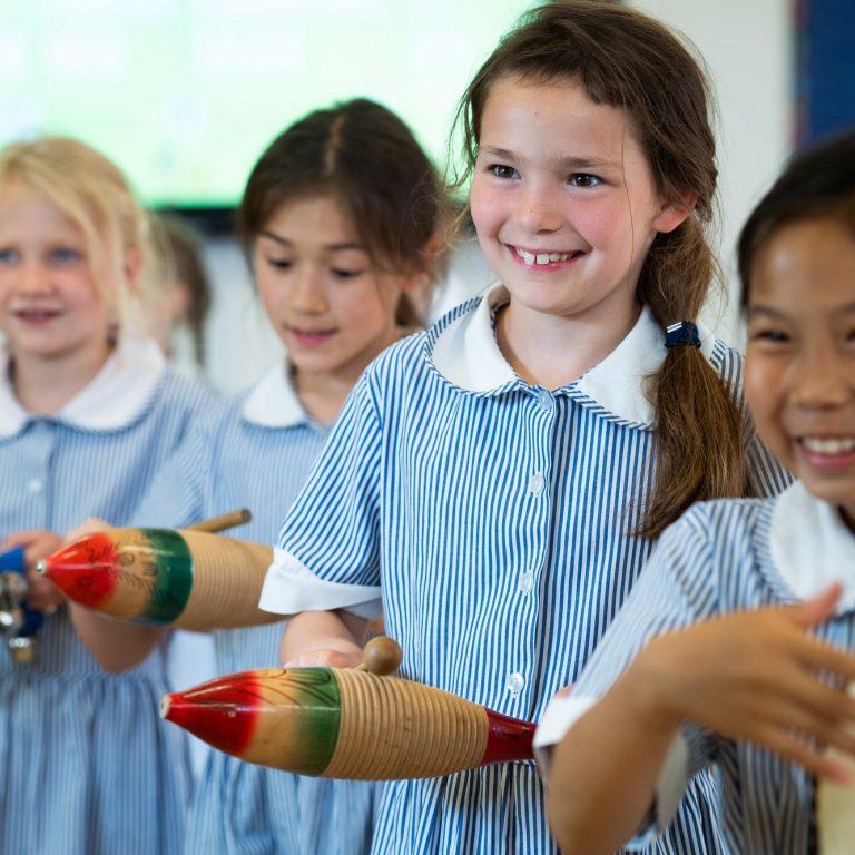 children holding shakers