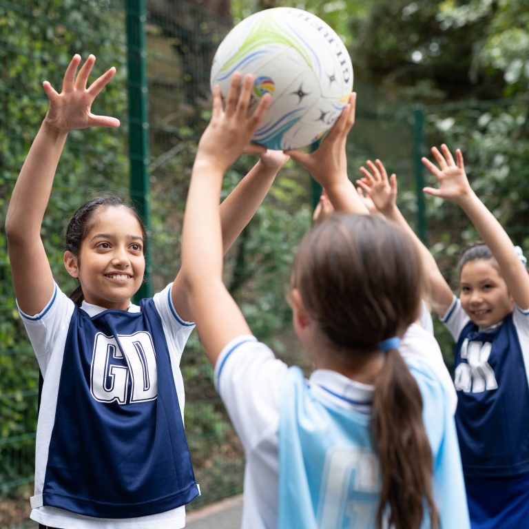 girl passing a ball