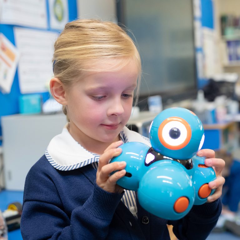 girl holding a toy