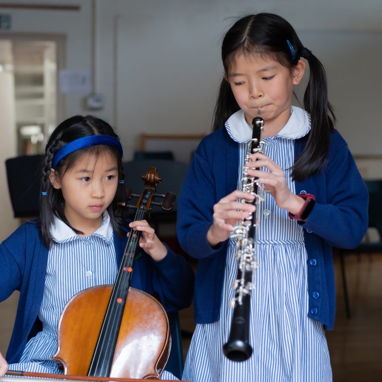 girls playing instruments