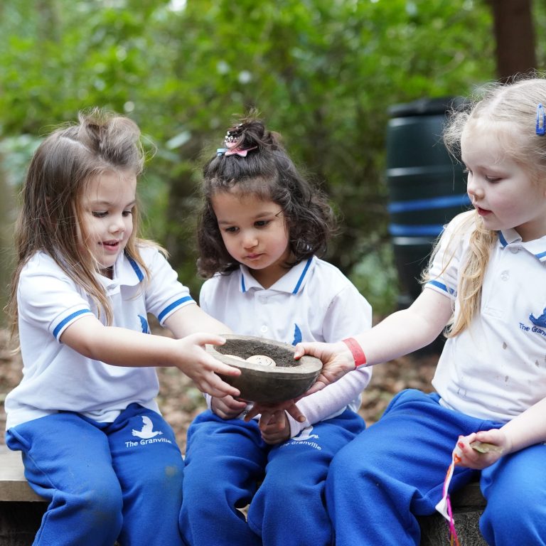 girl passing a bowl