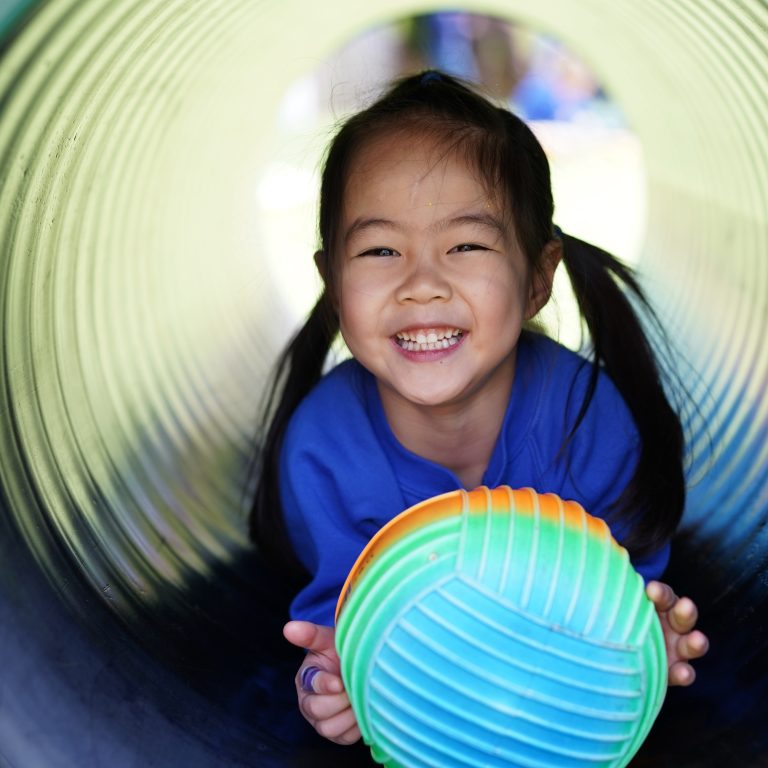 girl inside of a cylinder