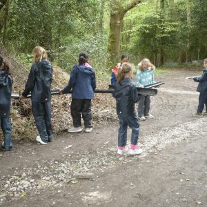 children cleaning up the outdoors