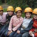 children with protective helmets on