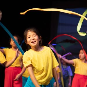 girls performing on stage