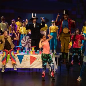 children performing on stage