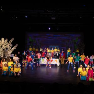 students on stage for a play