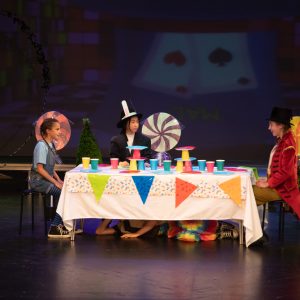 children performing on stage