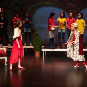 children performing on stage